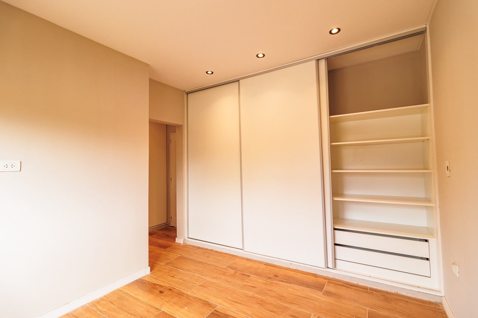 Dormitorio con placar